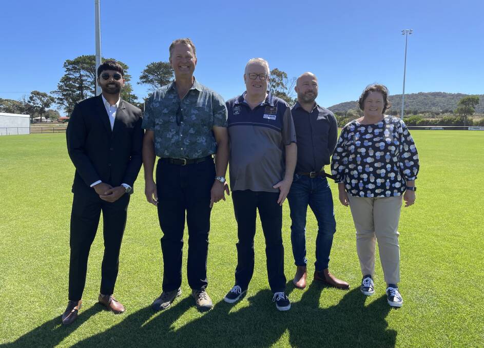 Relive the Rivalry's Jaimes Wiggins (middle) with George Town Council's Dravid Rao, Greg Kieser (mayor) and Shane Power as well as George Town Football Club president Lynette Burt. Picture by Brian Allen