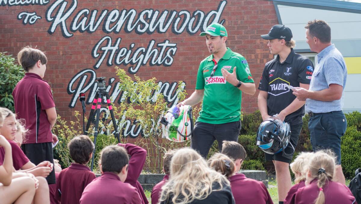 SHARING KNOWLEDGE: Supercars drivers Thomas Randle and Jake Kostecki answer questions from Ravenswood Heights students on Tuesday. Pictures: Phillip Biggs 