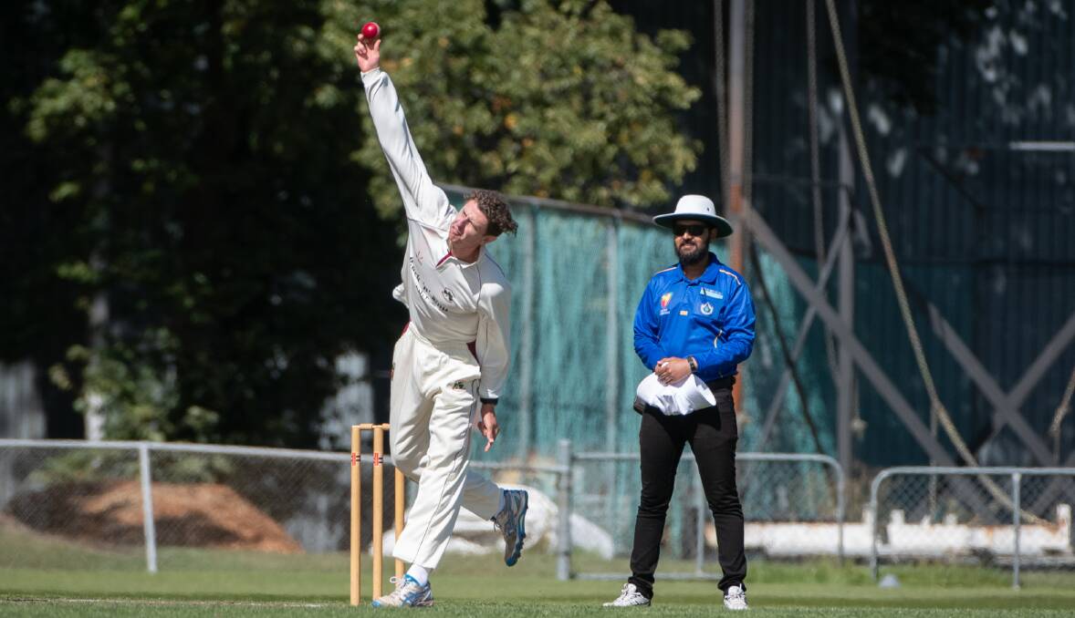 Bibek Sedhai umpiring the Cricket North grand final between Westbury and Launceston in March with Shamrocks captain Daniel Murfet bowling. Picture by Paul Scambler