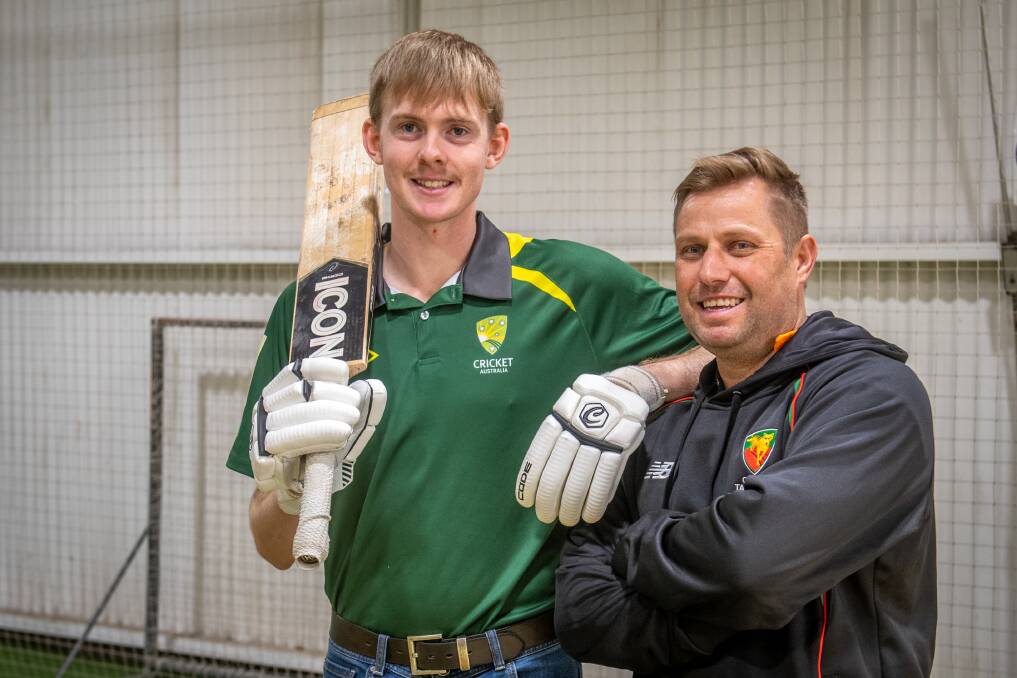 GOOD MATES: South Launceston's Connor Sheppard, who has been selected in the national intellectual disability squad, with assistant coach Liam Devlin. Pictures: Paul Scambler