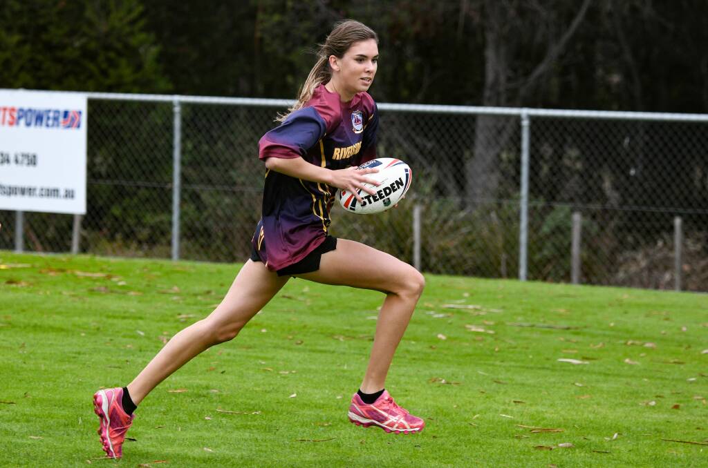 ON THE MOVE: Riverside High's Madison Brazendale runs during a Northern schools touch footy tournament game against Queechy. Picture: Paul Scambler