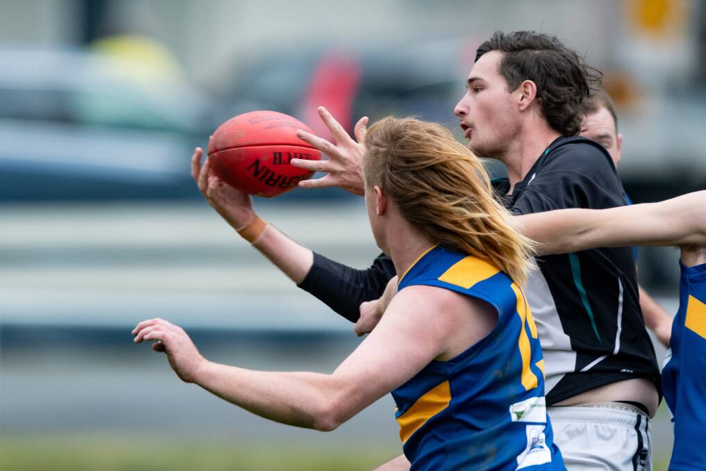 HANDS ON BALL: Perth's Billy Walker gains possession during his team's match-up against Evandale. 