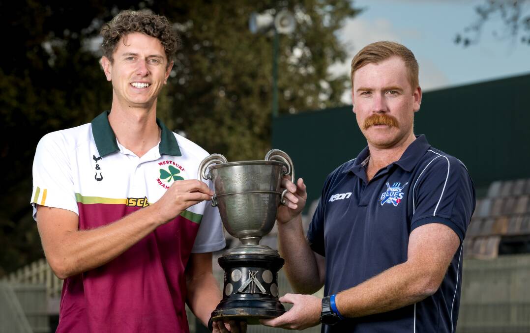 Westbury captain Daniel Murfet and Riverside skipper Peter New with the premiership cup at NTCA no. 1 on Wednesday. Pictures by Phillip Biggs