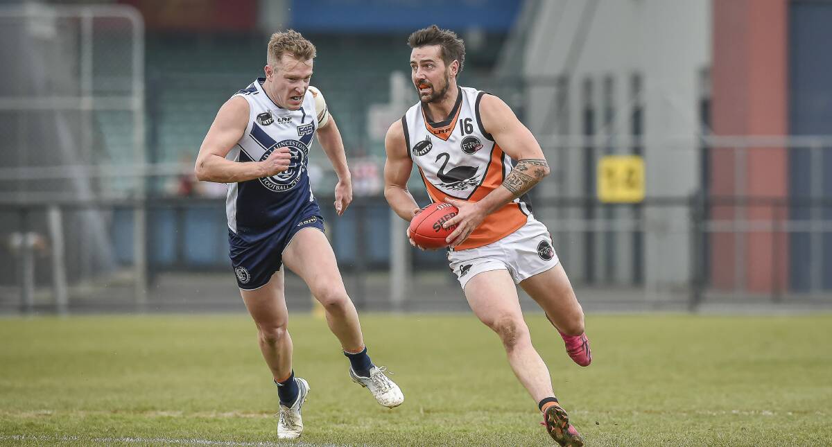 RUNNING HARD: East Coast's Robbie McManus dashes forward against Old Launcestonians in July. Picture: Craig George 