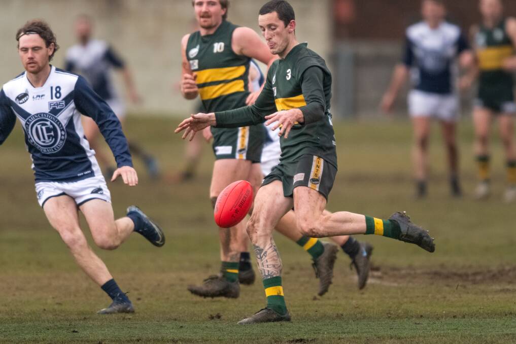 MOST RECENT OUTING: St Pats Jakob Laskey moves the ball on against Old Launcestonians during the Saints' most recent NTFA division one clash. Picture: Phillip Biggs 