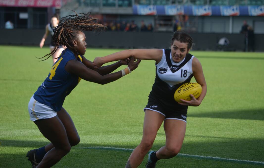 WORKING HARD: Evandale's Maggie Cuthbertson in action for the NTFAW on Saturday at UTAS Stadium. Picture: Brian Allen 