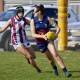 BIG DAY OUT: Old Scotch's Jamie Symons is chased by Hillwood's Siofra Clarke. Symons kicked five goals on Saturday at Youngtown Oval. Picture: Rod Thompson