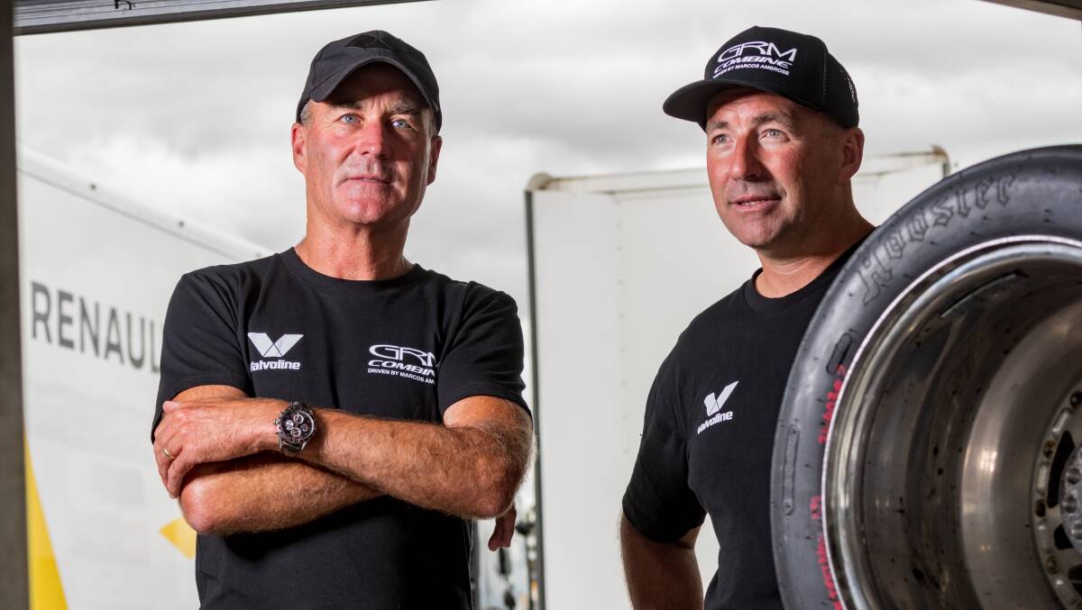 BRAIN'S TRUST: Barry Rogers and Marcos Ambrose take time out at the Garry Rogers Motorsport Combine. Picture: Phillip Biggs 