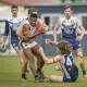 HIGH PRESSURE: East Coast's Toby Omenihu is swamped by Old Launcestonians players in their most recent clash. Picture: Craig George