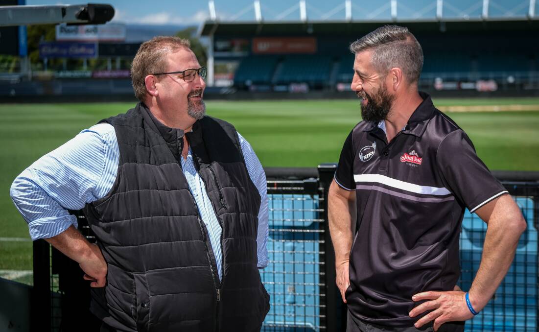 Former NTFA president Scott Rigby with new president Damien Rhind at UTAS Stadium on Friday. Pictures by Craig George 