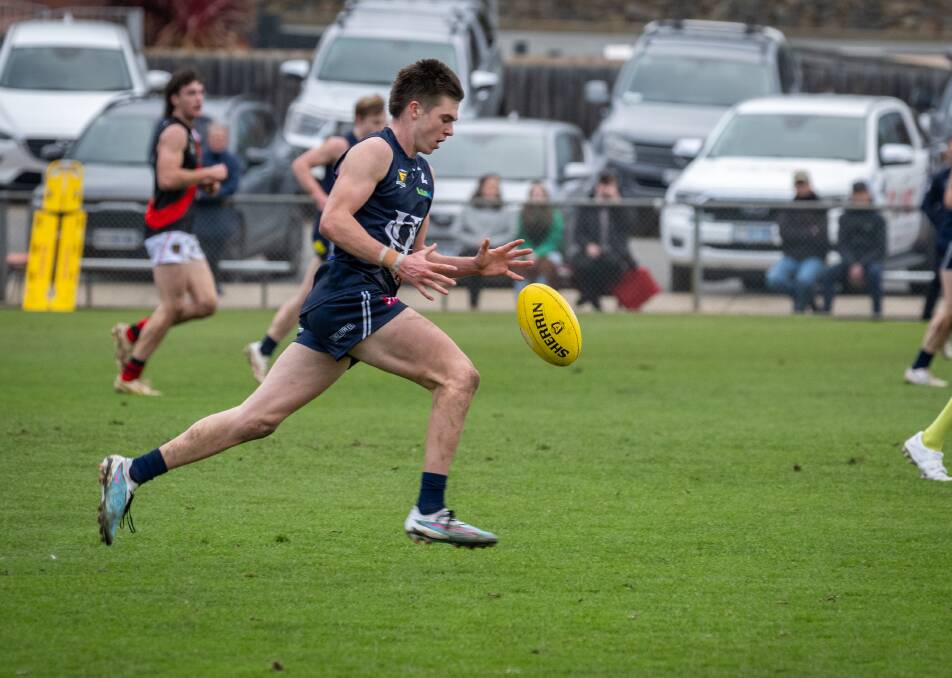 Launceston Blues product Colby Mckercher dashing forward at Windsor Park against North Launceston in 2023. Pictures by Paul Scambler 