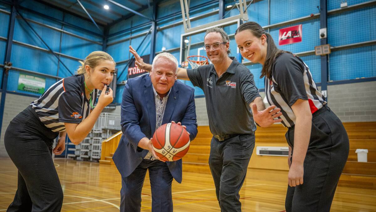 Referee Alexandria Pugh, Liberal candidate for Bass Rob Fairs, Launceston Basketball Association president Craig Gibson and referee Sophie Winter at Elphin Sports Centre. Pictures by Paul Scambler 
