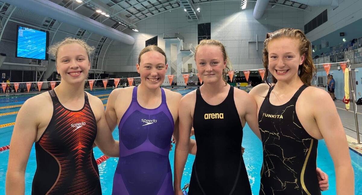 SMASHING IT: Tasmania's girls' 14 and under 4x50-metre freestyle team broke a state record with a time of 1:50.37 minutes. (l-r) Isabella Muldoon, Taylor Brock, Abbie King and Lacy Kamprad. Pictures: Supplied