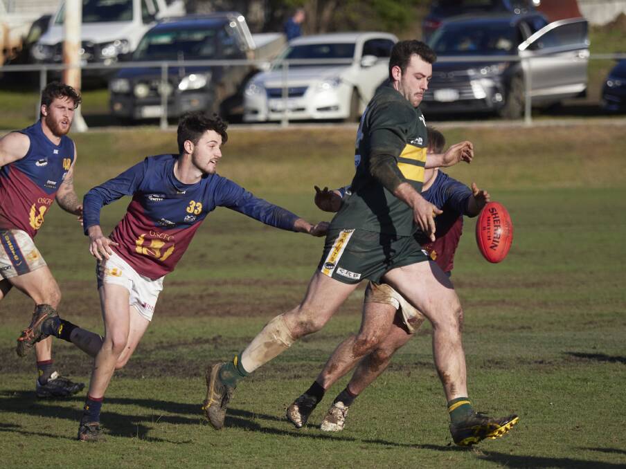 HOT ON HEELS: Old Scotch's Aiden Jackman chases St Pats' Jake Kilby. Pictures: Rod Thompson 