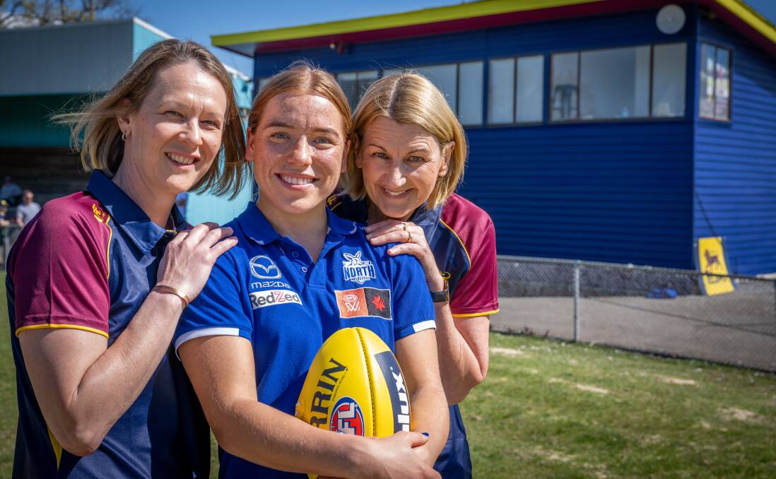 Mia King with former junior coach Deb Reynolds and ELJFC team manager Liz Dixon at the NTCA ground.