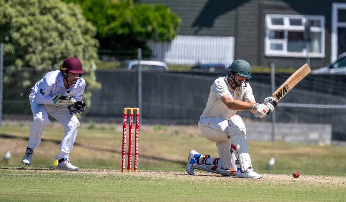 South Launceston batter Nathan Philip sweeps with Mowbray wicket-keeper Spencer Hayes behind the stumps. Picture by Paul Scambler 