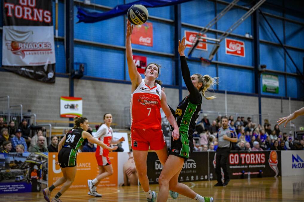 Launceston Tornadoes' Macey Crawford drives to the hoop at Elphin Sports Centre. 
