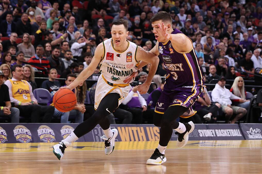 TOUGH LOSS: JackJumper Josh Magette drives past Sydney's Dejan Vasiljevic during game three of the NBL grand final series at Qudos Bank Arena on Wednesday night. Picture: Matt King/Getty Images 
