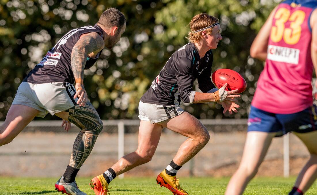 PLAYING WELL: Perth's Jakob Williams in action against Old Scotch earlier this year. He's tied for first in the NTFA division one MVP vote count. Picture: Phillip Biggs