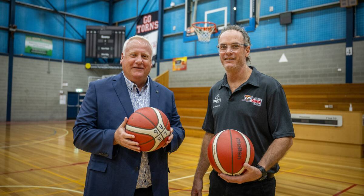 Liberal candidate for Bass Rob Fairs with Launceston Basketball Association president Craig Gibson.