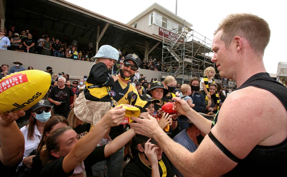 Former Richmond player Jack Riewoldt signs autographs at the Healing for Hillcrest AFL charity match in 2022. Picture by Rodney Braithwaite 