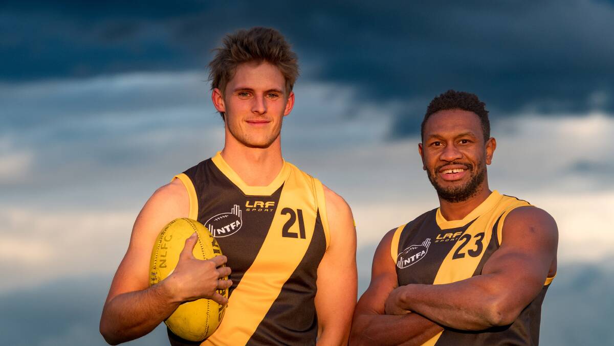 SIGNIFICANT MATCH: East Coast Swans players Adam Breen and Toby Omenihu in their St Marys heritage guernseys earlier this season. Picture: Phillip Biggs