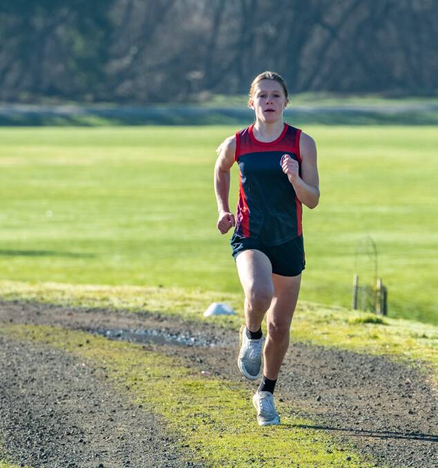 RUNNING WELL: Queechy's Aya Cottam, 12, leading the year seven girls' cross-country on Tuesday. Picture: Paul Scambler