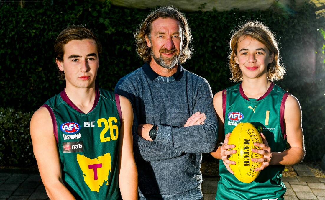 Former Tassie Mariners coach Adam Sanders with his sons Ollie, 17, and Ryley, 14, in 2019. Picture by Scott Gelston 