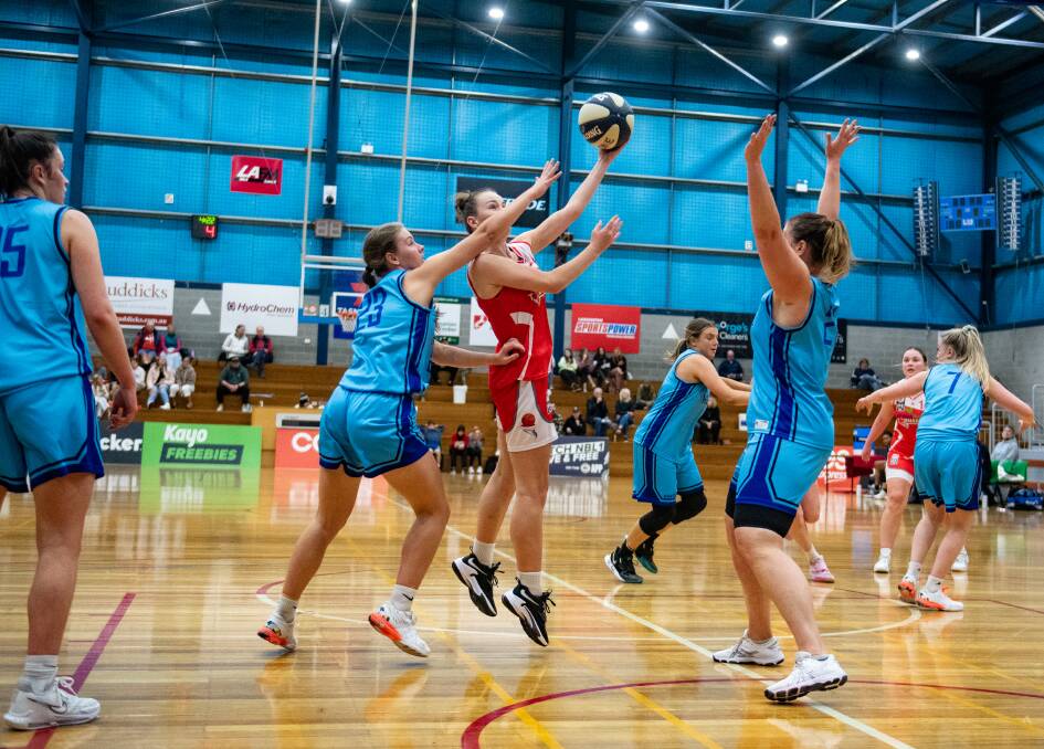 DRIVING TO HOOP: Launceston Tornadoes' Micah Simpson in action earlier this season. She played well on Saturday against Frankston. Picture: Paul Scambler