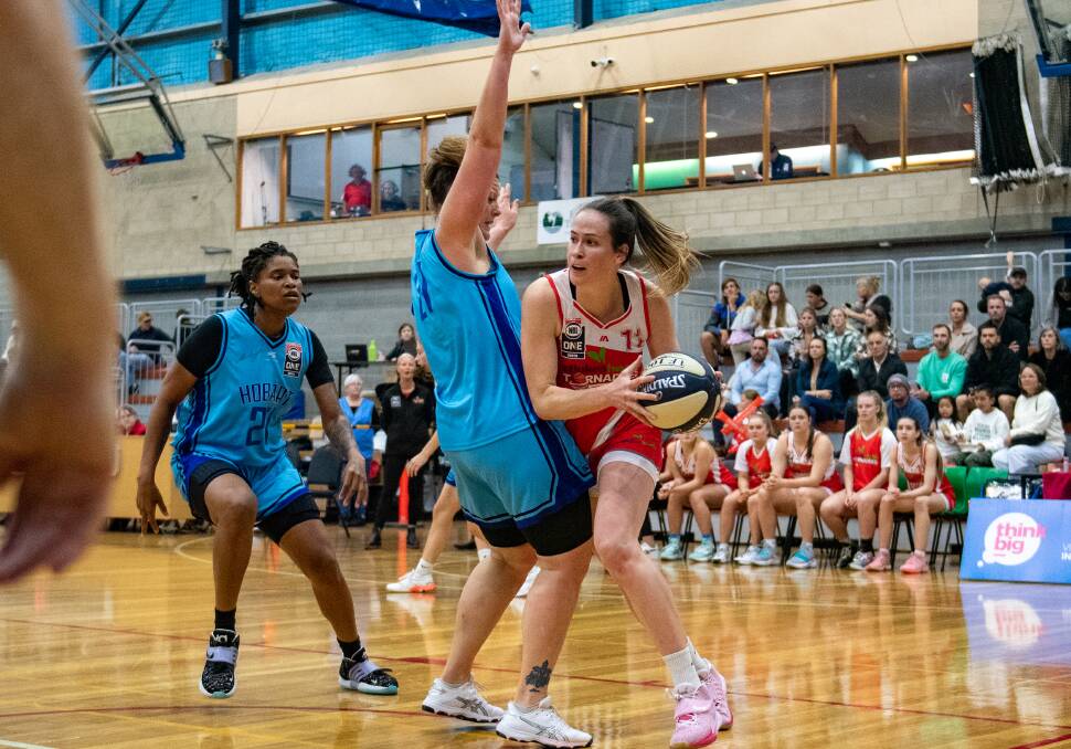 IMPORTANT PLAYER: Tornadoes skipper Keely Froling is defended by Hobart Chargers' Kylie McCauley at Elphin Sports Centre earlier this year. Picture: Paul Scambler