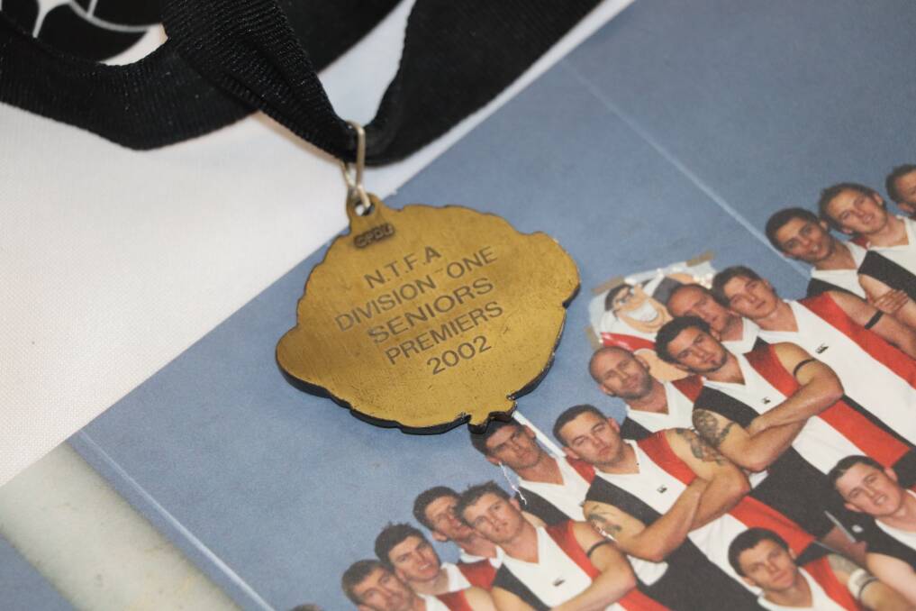 CHERISHED POSSESSION: George Town 2002 premiership medal. 
