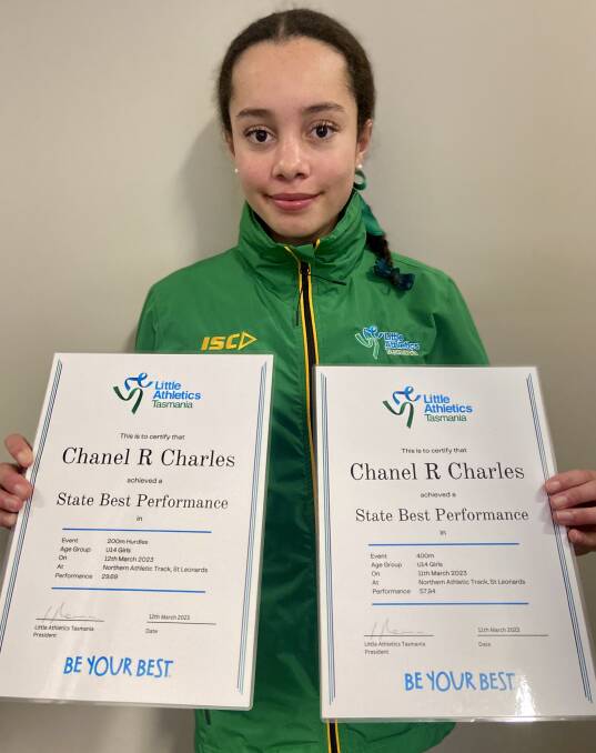Chanel Charles with certificates showing state records in Little Athletics Tasmania under-14 female 400m sprint and 200m hurdles. Picture supplied 