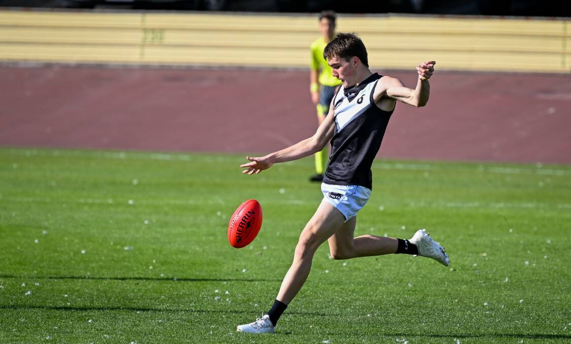 The NTFA's Ethan Crisp, of South Launceston, kicks long at Devonport Oval on Saturday. Picture by Katri Strooband