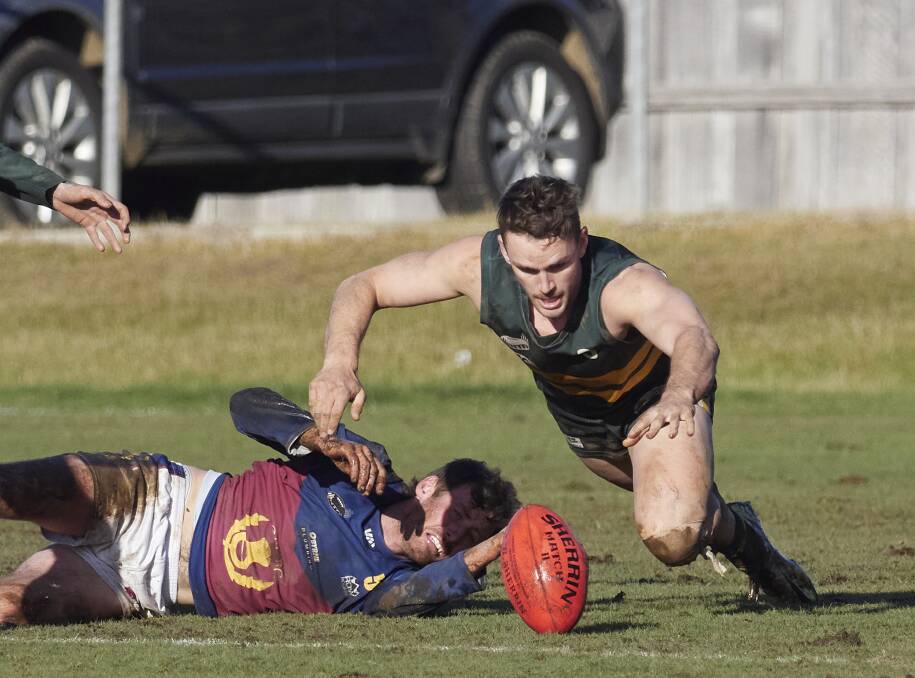 DESPERATION: St Pats' Jake King competes for the ball with Old Scotch's Jock Darke. Pictures: Rod Thompson 