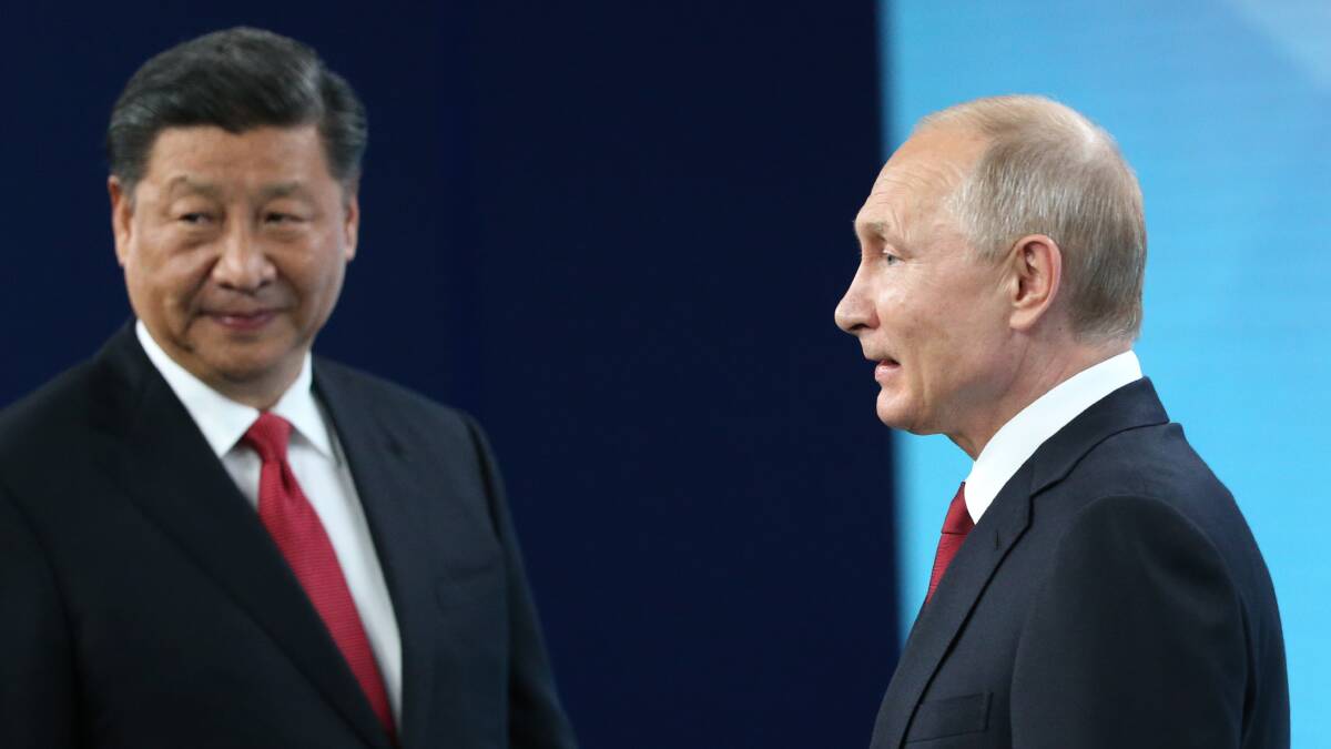 Russian President Vladimir Putin (right) and Chinese President Xi Jinping. Picture: Getty Images 