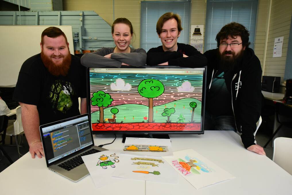 STEAM: Joe Robinson, Bridgette Kaminski, Nathaniel Bott and James Riggall of Bitlink with the game "The Adventures of Mustard Sunshine", created in a Bitlink after-school program. Picture: Paul Scambler