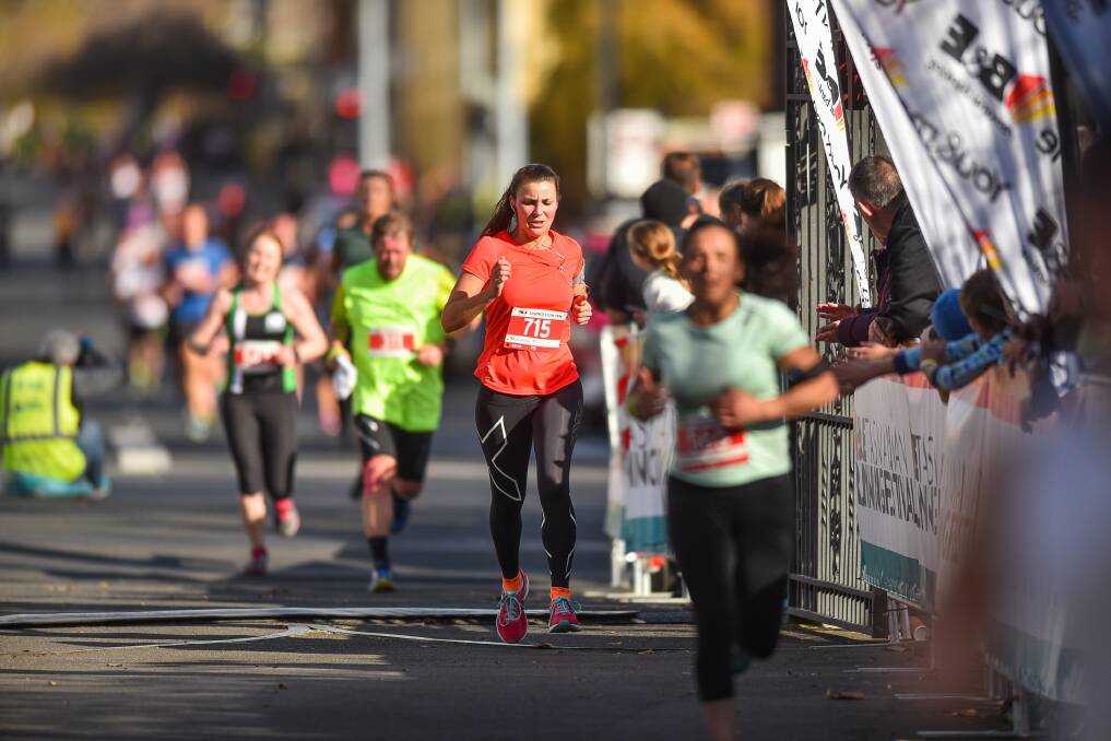 To the finish: Runners in the Launceston 10 race to the finish line. Picture: Scott Gelston
