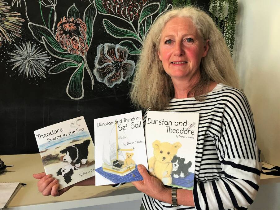 Author: Sharon Booth and her three children's books, written and illustrated by herself. Picture: Lucy Stone