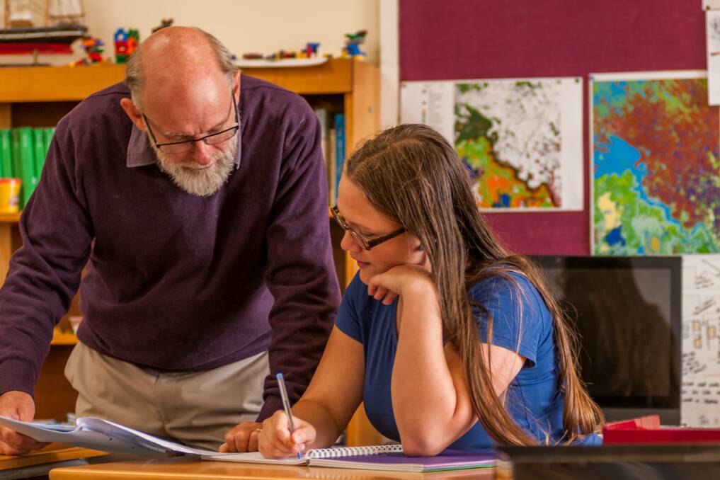Alternative learning: Capstone College principal Russell McKane and student Tiara Johnson. Pictures: Phillip Biggs