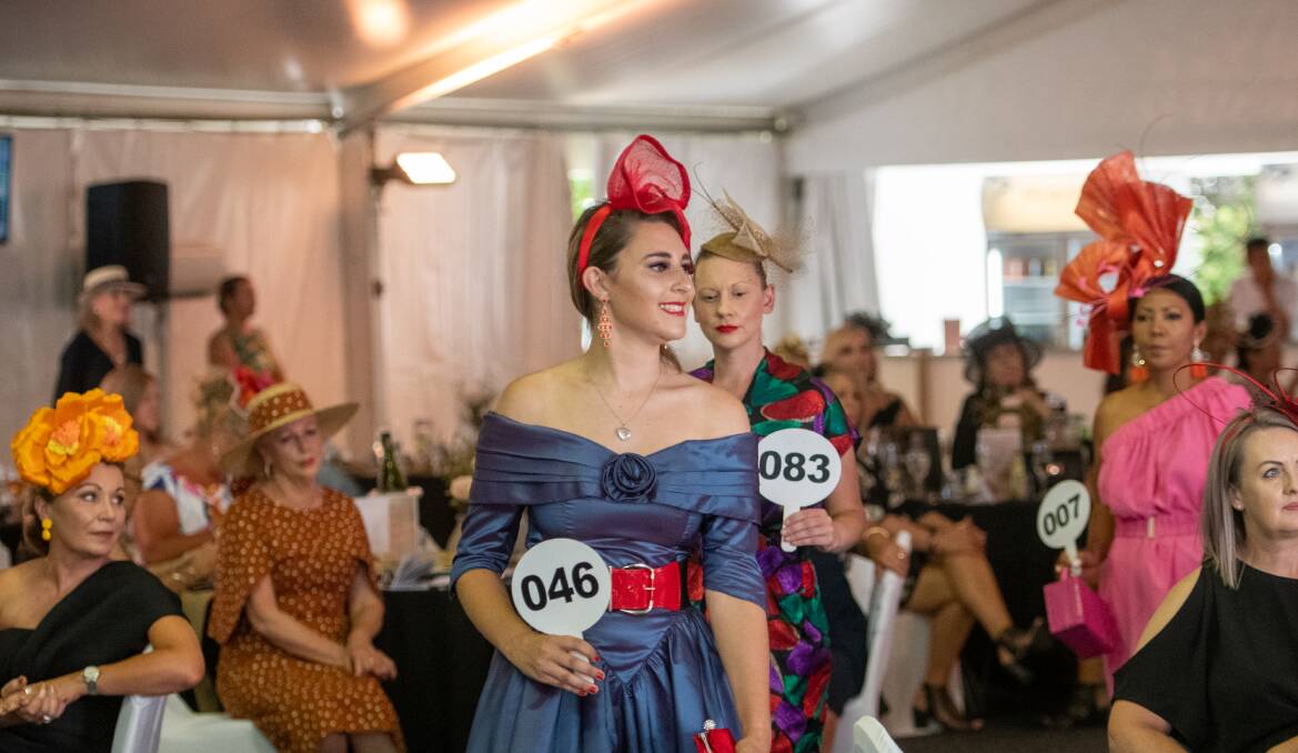 Sophie Dargan leads the women's parade through the marquee.