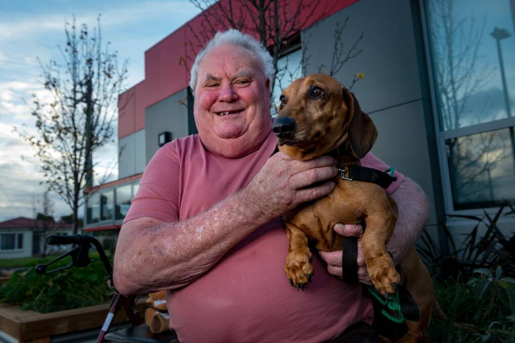 SHATTERED: Arthur Nash says his dog Daniel has kept him going after he lost his assets to the Public Trustee. Picture: Phillip Biggs.