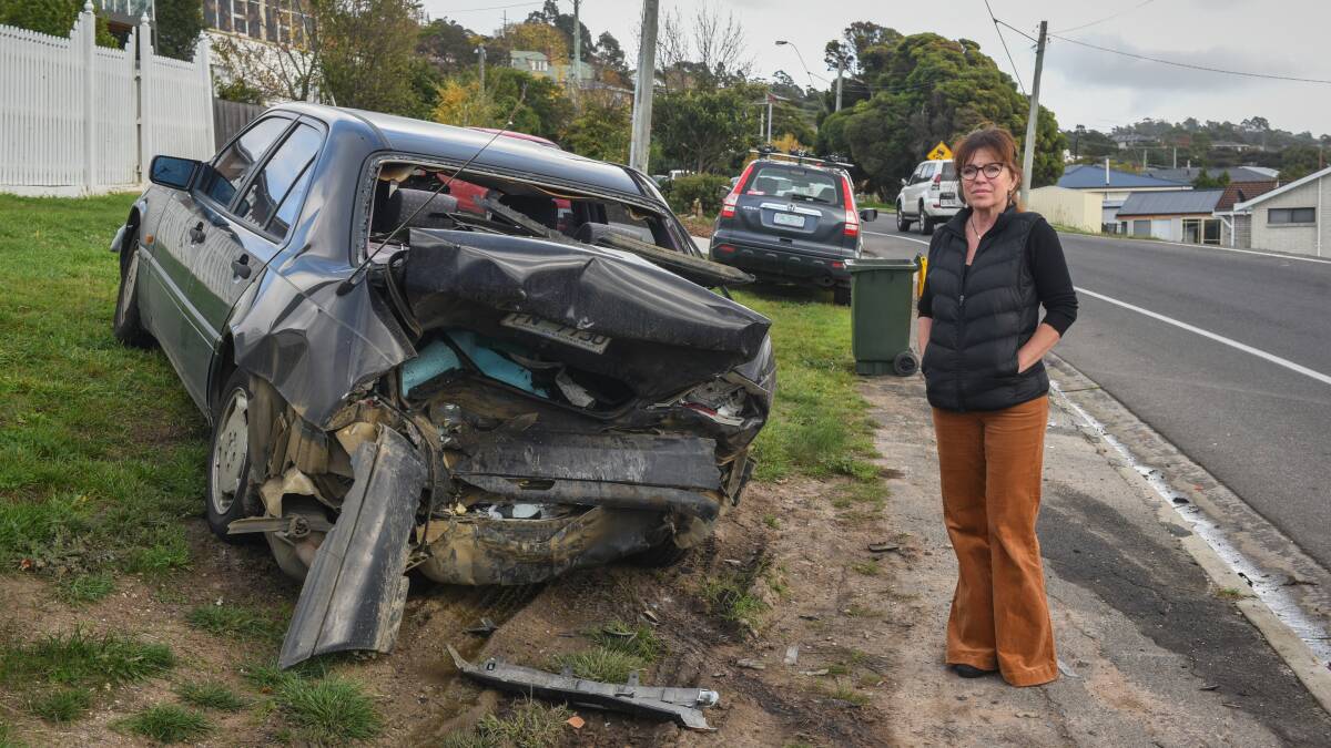 BANG: The damaged Mercedes Benz sedan of Edwina Joesler remains on the nature strip. Picture: Paul Scambler