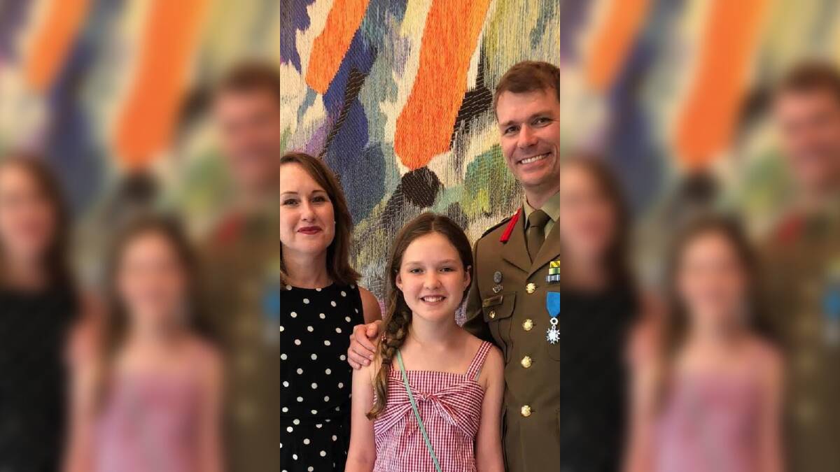 MAJOR PROMOTION: Marcelle and Sophia Smith with husband and father Major-General Chris Smith. Picture: Supplied 