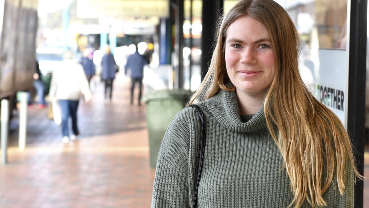 Neve Collins, of Wynyard, uses some cash, but says she could cope without it. Picture: Brodie Weeding.