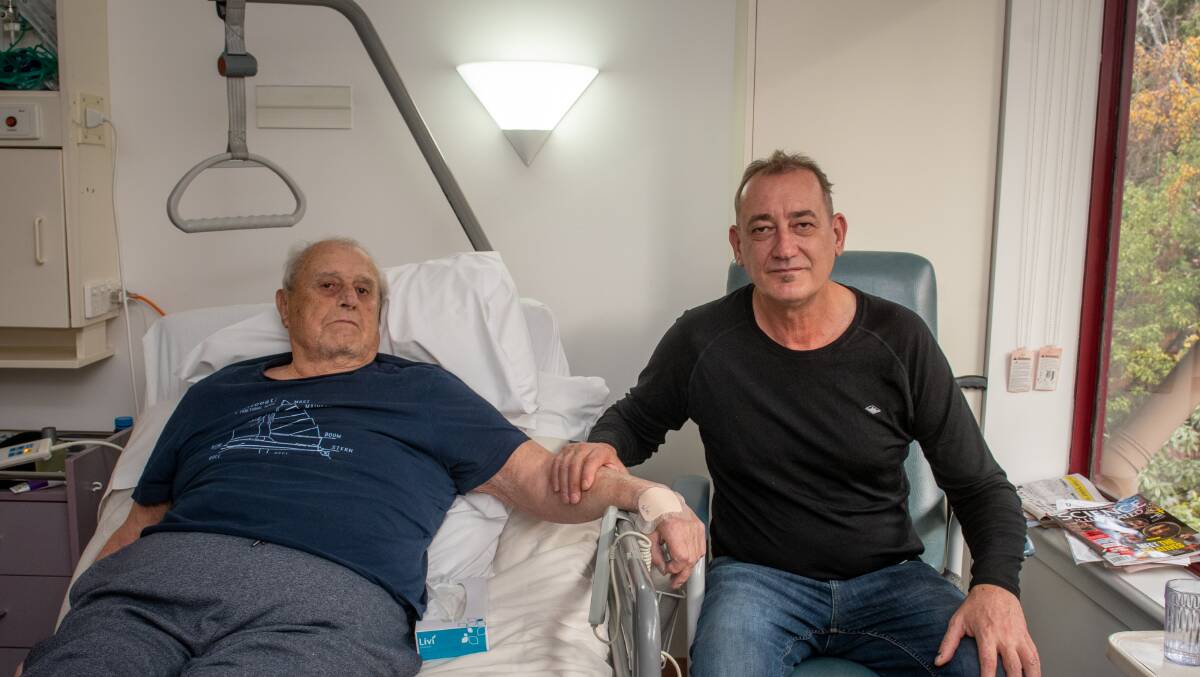 LEFT DEVASTATED: Gerhard Dammer recovering from a highway crash, with his son, Gerald. Picture: Paul Scambler.