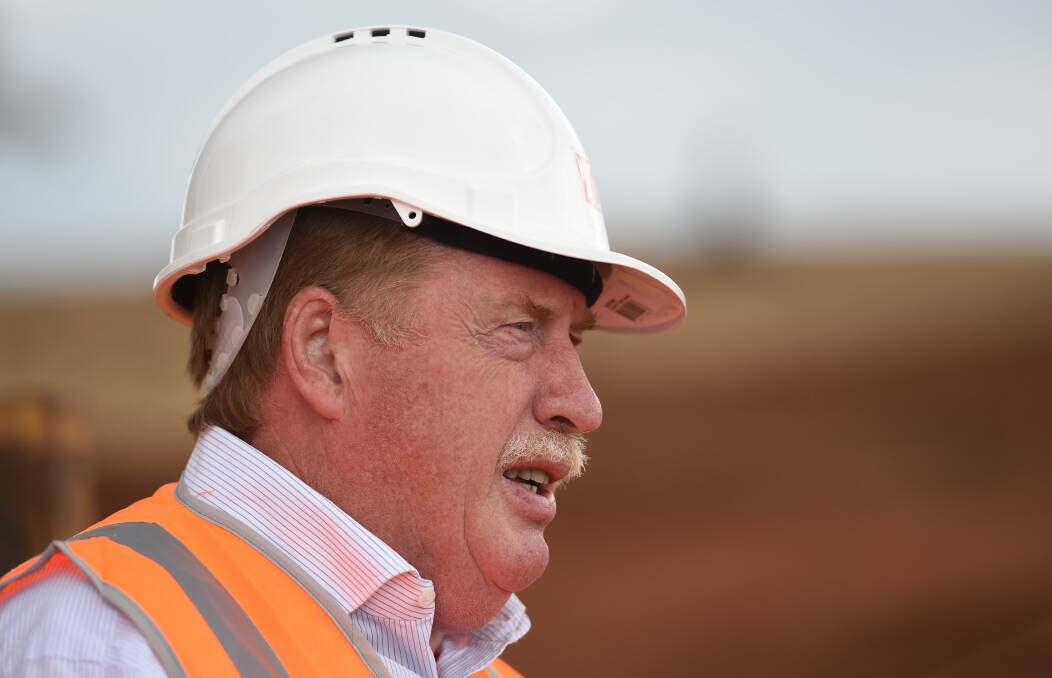 Paul Lennon at the opening of the Bald Hill bauxite mine, near Campbell Town. File picture