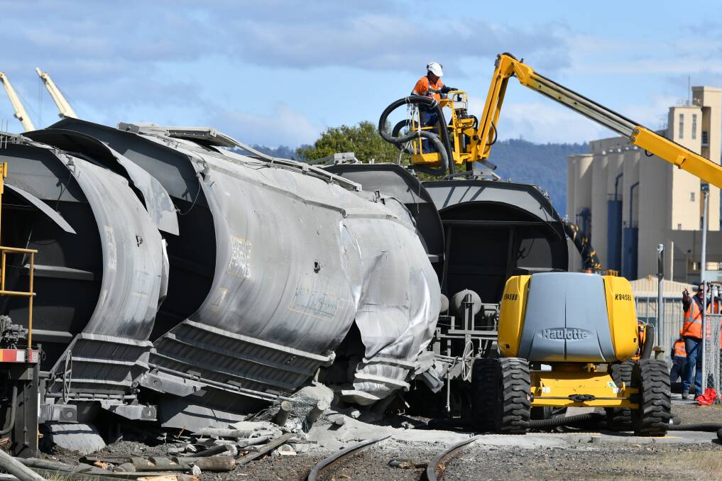 A scene from the wake of the train crash in Devonport in 2018. Picture by Brodie Weeding.