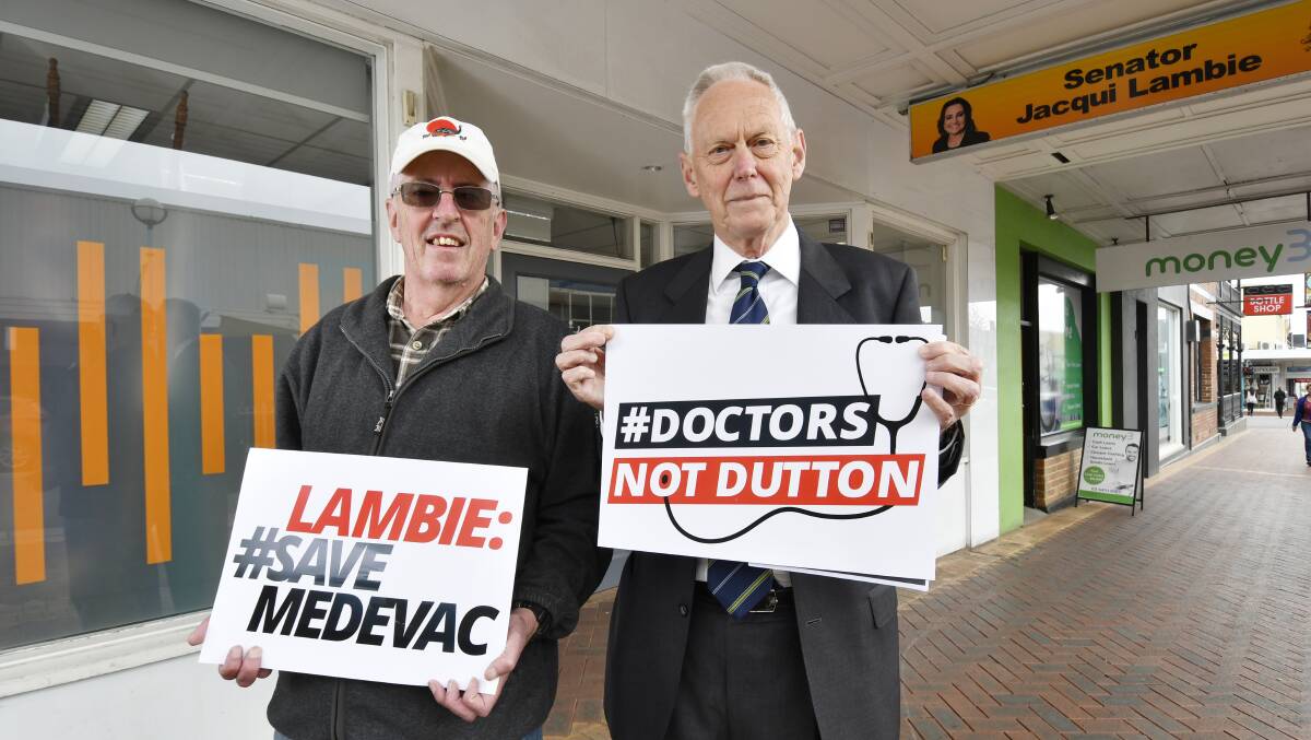 DELIVERY MEN: Ivan James, of Launceston, and John Tongue, of Devonport, delivered a petition to Senator Jacqui Lambies electorate office urging her to vote against the governments medivac repeal bill. Picture: Brodie Weeding.