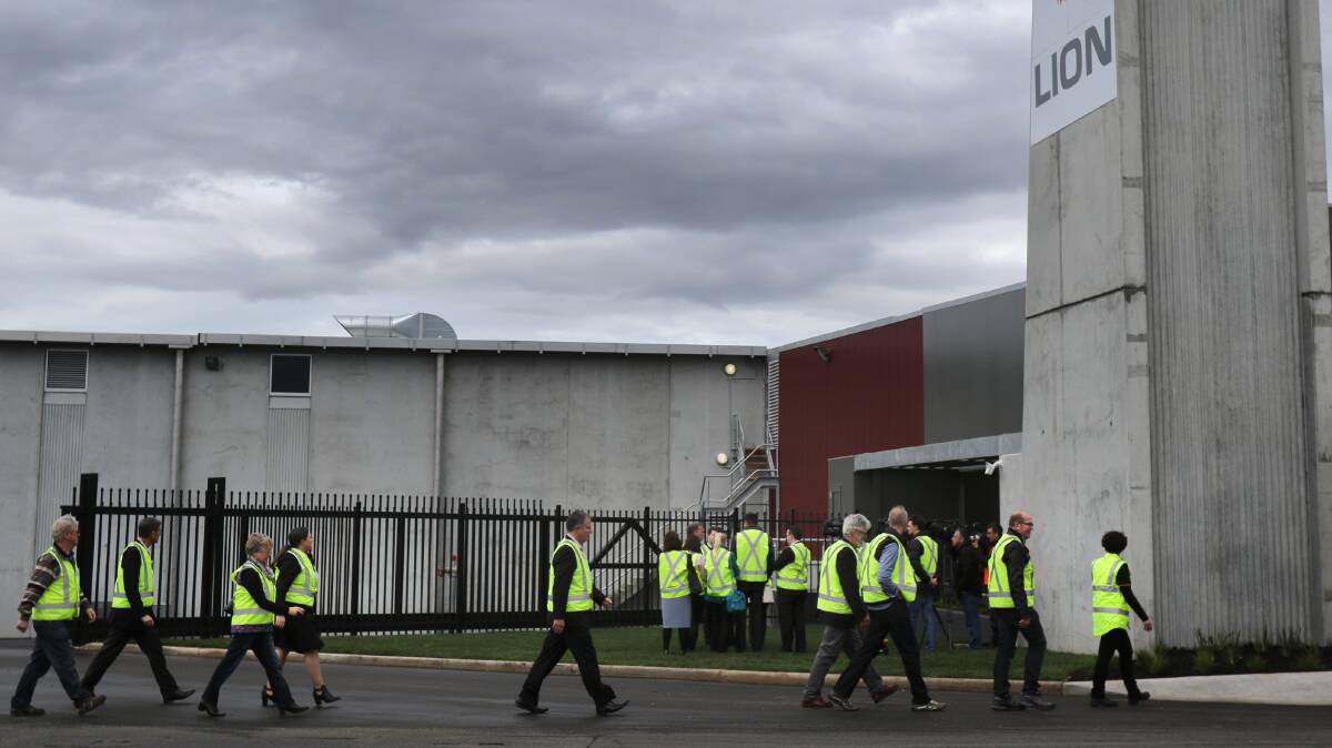 CHANGE COMING: Guests tour Lion's expanded The Heritage cheese making factory in Burnie in 2015.