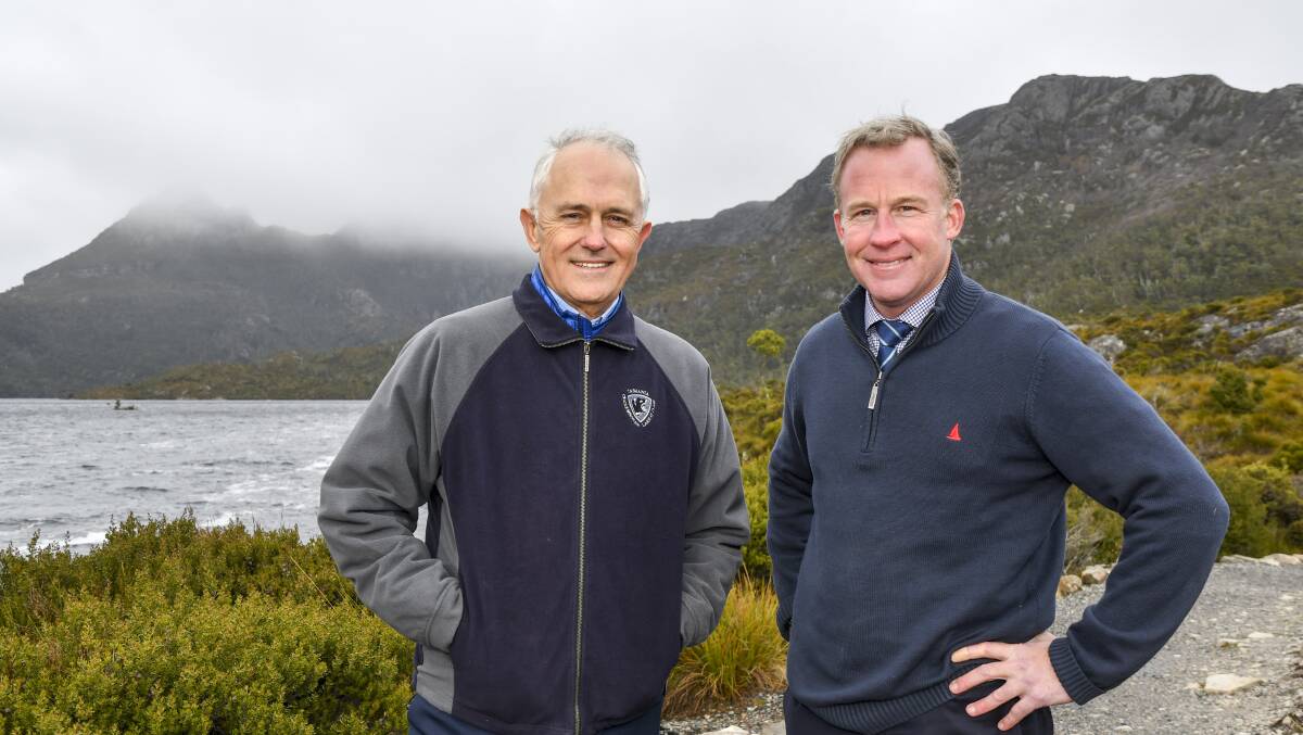 ENERGISED: Then-prime minister Malcolm Turnbull and Tasmanian Premier Will Hodgman at Dove Lake in July. 